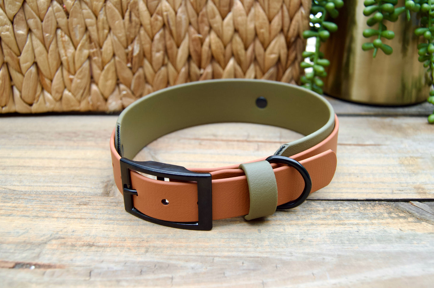 Dog collar with caramel and olive green biothane on a wooden surface